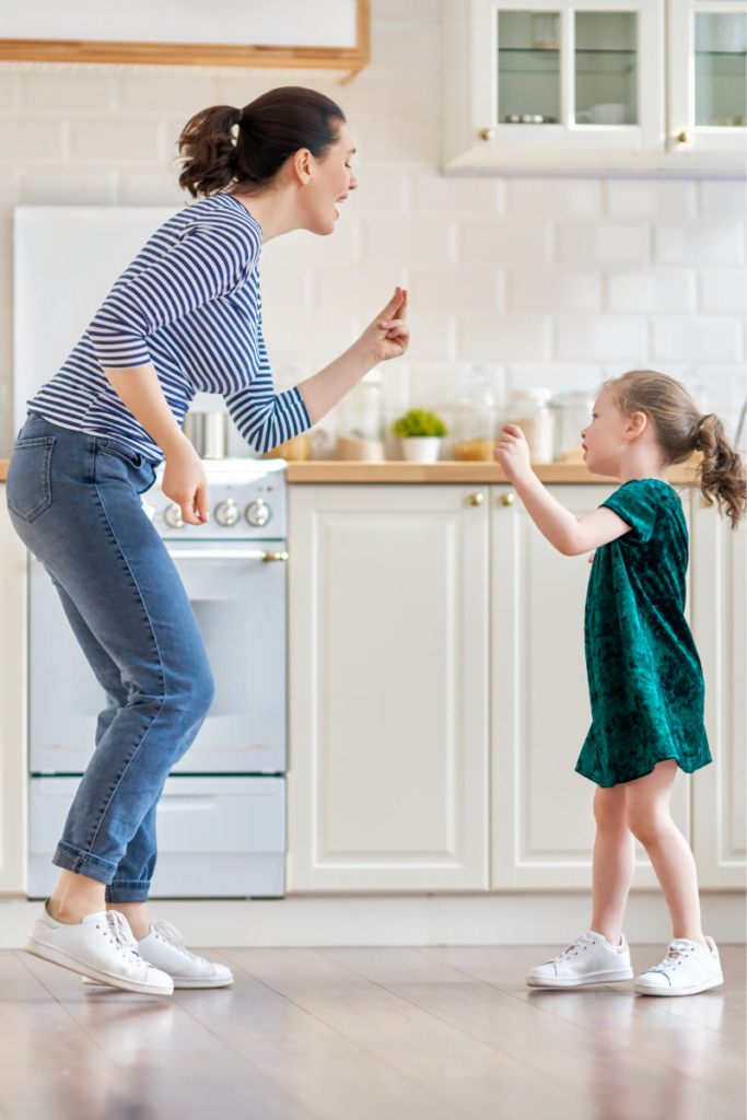 A mother and daughter bonding in a newly renovated the kitchen.