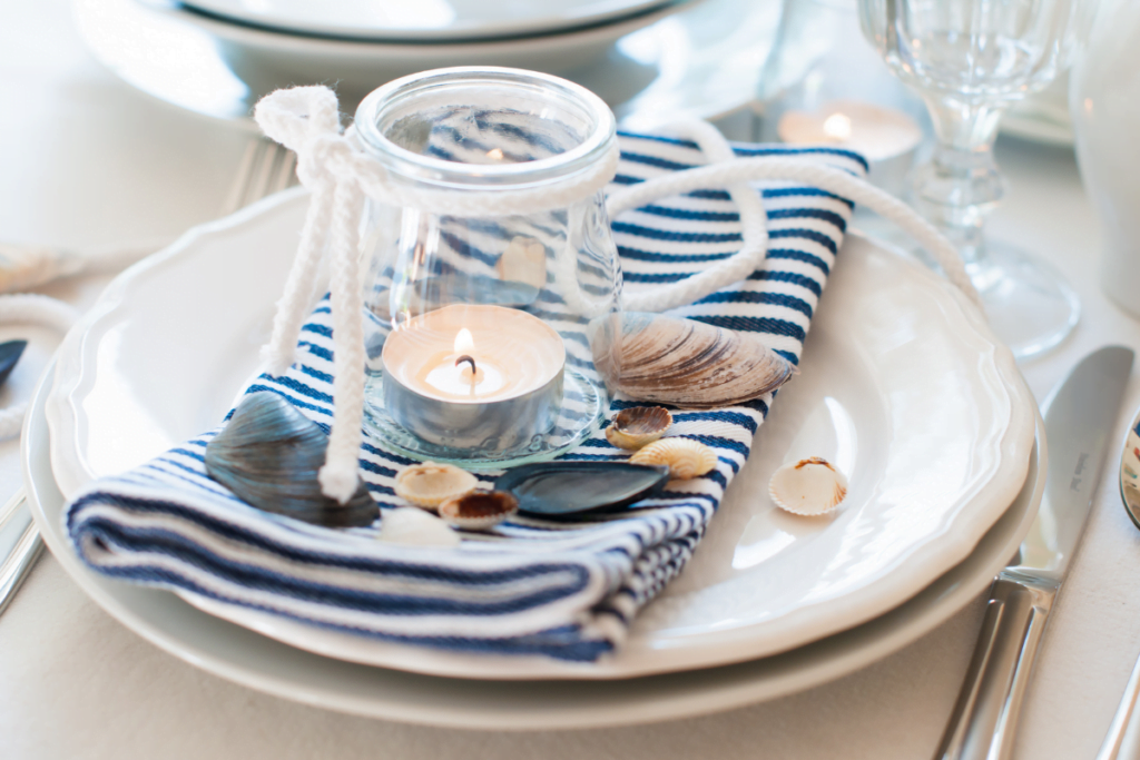 A coastal-style table napkin featuring blue and white stripes.