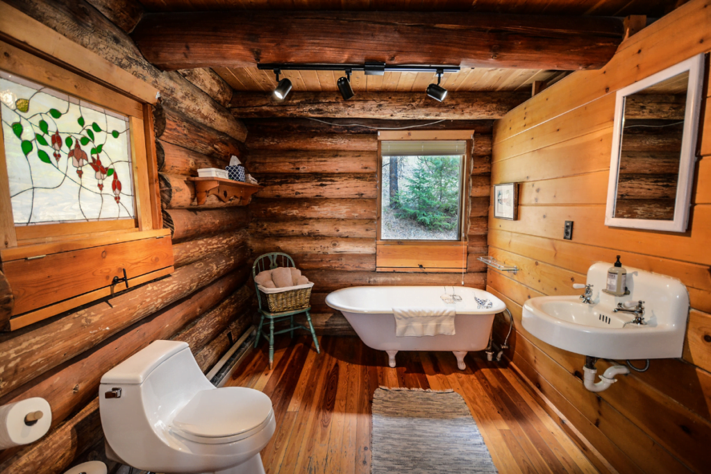 An eco-friendly bathroom in a log cabin.