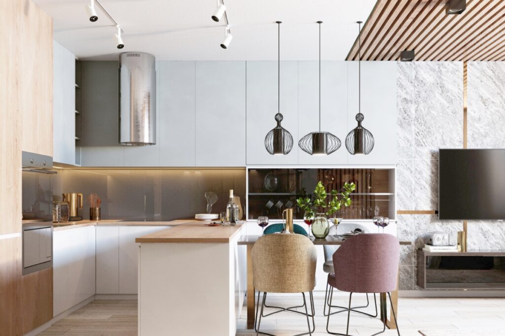 Modern kitchen maintenance tips and dining area with wooden cabinets, gray backsplash, and pendant lights over a table set for two.