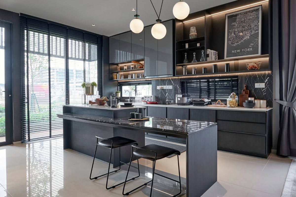 Modern kitchen with dark cabinets, an island with bar stools, spherical pendant lights, shelves displaying decor, and large windows with blinds letting in natural light. Wall art reads "NEW YORK." An integrated home automation system adds a touch of futuristic convenience to this stylish space.